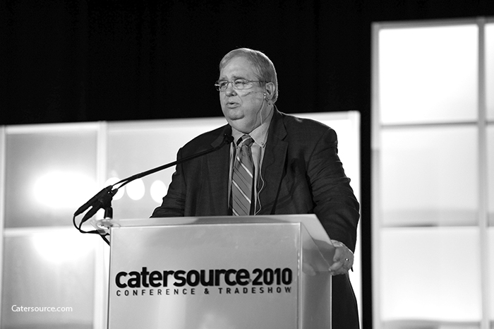 Mike Roman on stage at Catersource